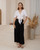 Designed for the modern woman who values both style and comfort, our Natalie Linen Blend Wide Leg Pants offer a flattering silhouette and luxurious feel. Crafted from a beautiful, soft linen/silk blend, they're perfect for warm weather and versatile enough to transition from casual daytime outings to chic evening gatherings. Featuring a comfortable high waist and a relaxed, flowing fit, our Natalie pants pair seamlessly with everything from fitted tops to oversized blouses. Elevate your wardrobe with this essential piece that promises both timeless appeal and ultimate comfort.

These pants feature:

Double button and zip front closure
Wide leg design
Functional side pockets
Linen/silk blend
Unlined
Colour: Black

Fabric: 55% Linen; 45% Silk

Size Guide: True to size. Stick to your usual size