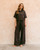 Lullaby Lace Top in black with lace trim, collared neckline and short sleeves styled on a model