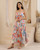 Aloha Maxi Dress featuring colourful tropical floral print, ruffle details and flowing maxi skirt