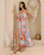 Aloha Maxi Dress featuring colourful tropical floral print, ruffle details and flowing maxi skirt