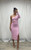 Model wearing a form-fitting, pink one-shoulder Mia Ribbed Midi Dress featuring a single long sleeve, a side waist cutout and  side split.