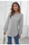 You will fall in love with our super soft and comfy Frankie Knit. The button detail on the sleeves give this  lightweight, comfy knit some character! Perfect for layering, you can easily wear this knit over a cami and under a jacket for extra warmth. Pair with your fave denim and boots and you're ready to roll!

This top features:

Boat neckline
Long sleeves with ribbed cuffs
Button detail on sleeves
Lightweight
Relaxed fit
Super soft feel
Colour: Grey

Fabric: 50% Cotton; 45% Polyester; 5% Spandex
Suburban Closet