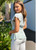 Our Josie Wrap Top is fun, flirty and just so pretty. We love the sweet flutter sleeve and tie up waist details. This top pairs perfectly with your fave denim styles for sweet weekend looks.

This top features:

V-neckline
Short flutter sleeves
Tie up waist
Wrap style
Curved hemline
Textured fabric
Regular fit
Colour: Sage

Fabric: 100% Viscose

Size Guide: True to size. Model is 173cm and wears a size 8.