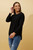 Our Joni Ribbed Knit is an easy go-to top that can be worn under anything! Pair with high-waisted jeans and sneakers for a casual and cosy look perfect for those weekend errands.

This knit features:

Round neck
Long dolman sleeves
Ribbed design
Curved round hem
Colour: Black

Fabric: 98% Polyester, 2% Spandex

Size Guide: True to size! Model is 173cm and wears a size 8. Model 2 is 174cm and wears a size 14.