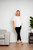 So chic, yet so sweet, our Tillie Chiffon Top is going to be your new fave this summer. This cotton blend beauty features a flowy design and flutter sleeves. Dress up with a pair of our Wet Look Skinny Jeans or wear it casually with your fave denim. 

This top features:

V-neckline
Flutter sleeves
Textured chiffon fabric
Curved hemline
Longer length at the back
Lined
Relaxed fit
Colour: White

Fabric: 85% Cotton, 15% Polyester

Size Guide: True to size. Order your usual size.