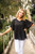 Tillie Chiffon Top in Black

So chic, yet so sweet, our Tillie Chiffon Top is going to be your new fave this summer. This cotton blend beauty features a flowy design and flutter sleeves. Dress up with a pair of our Wet Look Skinny Jeans or wear it casually with your fave denim. 

This top features:

V-neckline
Flutter sleeves
Textured chiffon fabric
Curved hemline
Longer length at the back
Lined
Relaxed fit
Colour: Black

Fabric: 85% Cotton, 15% Polyester

Size Guide: True to size. Order your usual size as this top is meant to be flowy and relaxed.