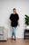 Tillie Chiffon Top in Black

So chic, yet so sweet, our Tillie Chiffon Top is going to be your new fave this summer. This cotton blend beauty features a flowy design and flutter sleeves. Dress up with a pair of our Wet Look Skinny Jeans or wear it casually with your fave denim. 

This top features:

V-neckline
Flutter sleeves
Textured chiffon fabric
Curved hemline
Longer length at the back
Lined
Relaxed fit
Colour: Black

Fabric: 85% Cotton, 15% Polyester

Size Guide: True to size. Order your usual size as this top is meant to be flowy and relaxed.