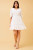 Step out in style in our Bohemia Mini Dress! This boho beauty will never go out of date and features gorgeous lace trim details, ruffled hemline and pockets!!! It is the perfect dress to wear to so many occasions such as Christenings, baby showers and brunch dates. Pair with wedged heels and gold accessories for a chic bohemian look.

This dress features:

V-neckline with lace trim detail
Short sleeves with lace trim cuffs
In seam side pockets
Lace trim on waist and hem
Ruffle hemline
Lined
Colour: White

Fabric: 100% Viscose

Size Guide: True to size. Model is 171cm tall and wears a Size 8.