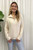 Our gorgeous Taylor Zip Knit is an easy go-to jumper that can be worn over anything! Pair with high-waisted jeans and sneakers for a casual and cosy look perfect for those weekend errands or our Wet Look Skinny Jeans for date night.

This knit features:

Collar with functional zip feature
Long sleeves with ribbed cuffs
Ribbed hemline
Dropped shoulders
Colour: Beige

Fabric: 65% Acrylic, 35% Wool

Size Guide: S/M fits sizes 8-12, M/L fits sizes 12-16.