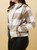 Our Natalia Teddy Bomber Jacket is a cosy and stylish option this winter! The fluffy texture and the mocha and beige check pattern give it a fashionable and versatile look. Pair with jeans or leggings or layer over a long-sleeved top for a warm, casual and comfortable look.

This jacket features:

High neckline
Exposed centre front zipper
Front functional pockets
Functional inside pockets
Soft and fluffy fabric
Colour: Mocha and White Check

Fabric: 100% Polyester

Size Guide: True to size. Model is 171cm tall and wears a size 8.