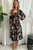 Introducing our Lyndall Floral Midi Dress! This gorgeous, feminine dress features a stunning floral print, shirred bodice and long sleeves for the perfect combination of style and comfort. Pair with strappy heels or black boots for your next garden party!

This dress features:

Square neckline 
Shirred bodice
Long sleeves with elastic cuffs
Not lined
Midi length
Colour: Black with Floral Print

Fabric: 100% Polyester

Size Guide: True to size.