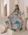 Get summer vacation ready in our fun Clara Maxi Dress. This fun tropical fruit print maxi features short, flutter sleeves and shirred detail at the back for comfort! Pair with sandals, a hat and sunnies and you're ready to relax and enjoy the sun.

This dress features: 

V neckline
Flutter sleeves
Hook and eye (x3) on bust
Functional buttons on front
Front panel detail
Shirred detail on back
Tropical fruit abstract
Maxi length
Unlined
Colour: Green with Tropical Fruit Print

Fabric: 86% Rayon, 14% Viscose

Size Guide: True to size. Model wears a size 8.