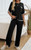 Our stunning Monica Cotton Lounge Set is a must have this season! Perfect to wear to so many occasions, but it also will become your perfect travelling outfit as it's just so comfy! The contrast stitching and split detail add a touch of elegance to this cosy set. Pair with strappy heels or ankle boots to wear to the office or sneakers for a cute casual look.

This set features:

Crew neckline
Dropped shoulders
Elbow length sleeves
Functional front pocket
Long, high waist pant, with elastic waistband
Side splits on sleeves, hemline and pants
Top is longer at the back
Contrast stitching
Unlined
Has Stretch
Relaxed style
Colour: Black

Fabric: 100% Cotton

Size Guide: Relaxed fit. Size S = 8-10; Size M = 10-12, Size L = 12-14; Size XL = 14-16.