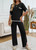 Our stunning Monica Cotton Lounge Set is a must have this season! Perfect to wear to so many occasions, but it also will become your perfect travelling outfit as it's just so comfy! The contrast stitching and split detail add a touch of elegance to this cosy set. Pair with strappy heels or ankle boots to wear to the office or sneakers for a cute casual look.

This set features:

Crew neckline
Dropped shoulders
Elbow length sleeves
Functional front pocket
Long, high waist pant, with elastic waistband
Side splits on sleeves, hemline and pants
Top is longer at the back
Contrast stitching
Unlined
Has Stretch
Relaxed style
Colour: Black

Fabric: 100% Cotton

Size Guide: Relaxed fit. Size S = 8-10; Size M = 10-12, Size L = 12-14; Size XL = 14-16.