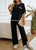 Our stunning Monica Cotton Lounge Set is a must have this season! Perfect to wear to so many occasions, but it also will become your perfect travelling outfit as it's just so comfy! The contrast stitching and split detail add a touch of elegance to this cosy set. Pair with strappy heels or ankle boots to wear to the office or sneakers for a cute casual look.

This set features:

Crew neckline
Dropped shoulders
Elbow length sleeves
Functional front pocket
Long, high waist pant, with elastic waistband
Side splits on sleeves, hemline and pants
Top is longer at the back
Contrast stitching
Unlined
Has Stretch
Relaxed style
Colour: Black

Fabric: 100% Cotton

Size Guide: Relaxed fit. Size S = 8-10; Size M = 10-12, Size L = 12-14; Size XL = 14-16.