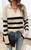 A comfy, relaxed knit that will never go out of style is what we love about our Indiana Cotton Blend Knit. This knit features a V-neckline with collar and a classic, horizontal stripe. Whether you're relaxing at home or heading out for a laid-back day, this versatile knit is sure to become a go-to piece in your wardrobe. Pair with your fave denim for an effortless, chic look. 

This knit features: 

V-neckline with collar
Long sleeves with ribbed cuffs
Dropped shoulders
Ribbed hemline
Soft feel
Relaxed fit
Colour: Cream with Black Stripes

Fabric: 50% Cotton, 50% Viscose

Size Guide: Size S = size 8-10, size M = size 10-12, size L = size 12-14, size XL = size 14-16.