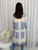 Our stunning Anika Wool Blend Cardigan is both chic and cosy and would be a great addition to your Autumn/Winter wardrobe. This super soft beauty features a collared neckline, two front pockets and can be worn with jeans and boots for a cute, casual look. 

This cardigan features:

Collared neckline
Open front
Ribbed cuffs on sleeves
2 front pockets
Longline
Relaxed fit
Colour: Blue and White Check

Fabric: 65% Acrylic, 35% Wool

Size Guide: Relaxed fit. Size S/M will fit 8-12. Size M/L will fit size 14-16. Model is wearing a size S/M and is 172cm tall.