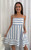 Effortlessly chic and endlessly versatile, our Tess Striped Mini Dress is your go-to for sunny days and seaside escapes. Featuring a soft blue and white stripe pattern, a flattering square neckline and adjustable spaghetti straps, this dress offers breezy comfort with a playful edge. The relaxed A-line fit and hidden side pockets make it as practical as it is pretty — perfect for beach strolls, brunch dates, or relaxed weekend adventures. Pair with sandals for a casual look or elevate with wedges and gold accessories.

This dress features:

Square neckline
Adjustable straps
A-line skirt
Shirring at back
Side pockets
Knee length
Unlined
Colour: Blue and White Stripe

Fabric: 70% Textured Rayon, 30% Tencel

Size Guide: True to size. Model is wearing a size 8 and is 172cm tall.