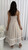 Our Shanae Linen Blend Midi Dress is the perfect blend of elegance and comfort. Crafted in a soft cotton and linen blend with playful white pic rac trim, this midi dress is ideal for sunny days, holidays, and relaxed weekends. Designed with adjustable spaghetti straps, a flowy silhouette, and practical side pockets, it’s a timeless piece that you’ll reach for year after year. Style effortlessly with our Ibiza Strappy Slides in camel for a casual daytime look, or elevate it with wedges and gold accessories for an evening out.
This dress features:
Shirring at back
Tiered skirt
Adjustable straps
Side pockets
Frilled hemline with ric rac detail
Ric rac detail poking up from front bodice
Unined
Colour: Natural with White Ric Rac Trim 
Fabric: 70% Cotton, 30% Linen
Size Guide: True to size Our Shanae Linen Blend Midi Dress is the perfect blend of elegance and comfort. Crafted in a soft cotton and linen blend with playful white pic rac trim, this midi dress is ideal for sunny days, holidays, and relaxed weekends. Designed with adjustable spaghetti straps, a flowy silhouette, and practical side pockets, it’s a timeless piece that you’ll reach for year after year. Style effortlessly with our Ibiza Strappy Slides in camel for a casual daytime look, or elevate it with wedges and gold accessories for an evening out.
This dress features:
Shirring at back
Tiered skirt
Adjustable straps
Side pockets
Frilled hemline with ric rac detail
Ric rac detail poking up from front bodice
Unined
Colour: Natural with White Ric Rac Trim 
Fabric: 70% Cotton, 30% Linen
Size Guide: True to size