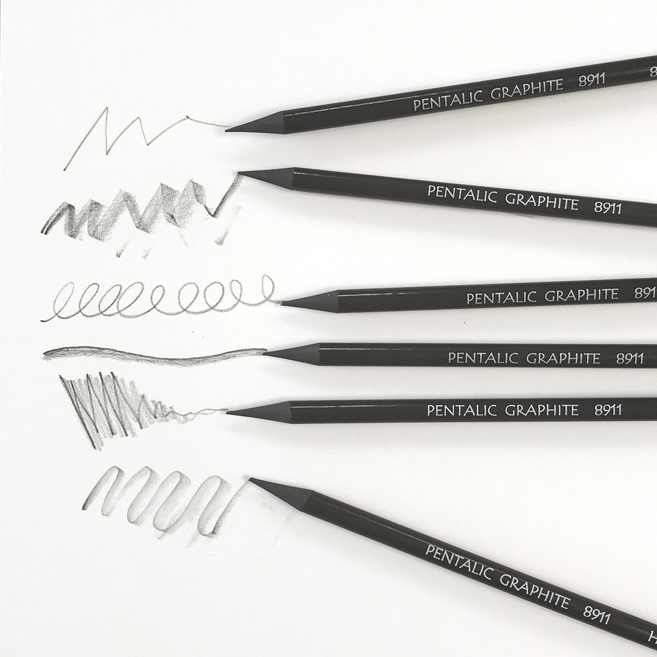 Woodless graphite pencils 