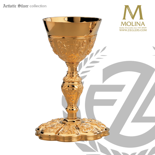 12 ounce florentine chalice stands 7 and 7 eighths inches high with grape and flower repousse metal work in choice of 2 compositions includes a paten made in spain by artistic silver AS2724 12 ounce florentine chalice stands 7 and 7 eighths inches high with grape and flower repousse metal work in choice of 2 compositions includes a paten made in spain by artistic silver AS2724