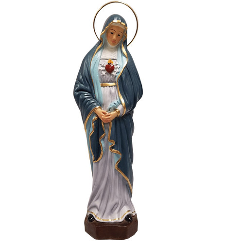 statue of our lady of sorrow made of plaster painted vivid colors with gold accents and halo measures 12 inches high k0414