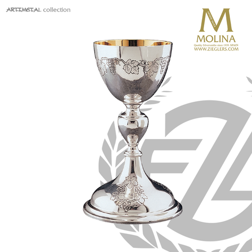 10 ounce chalice in grape and leaf style stands 8 and 7 eighths inches high comes with paten made in Spain by Molina AS504 10 ounce chalice in grape and leaf style stands 8 and 7 eighths inches high comes with paten made in Spain by Molina AS504