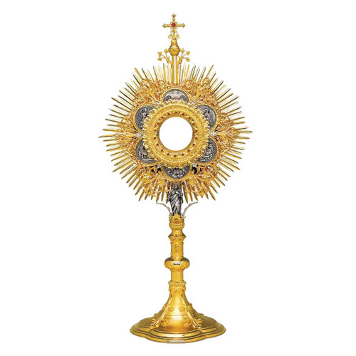 Traditional Monstrance with silver plated panels featuring the Lamb of God, the Holy Spirit, and the Four Evangelists and a figure of Jesus