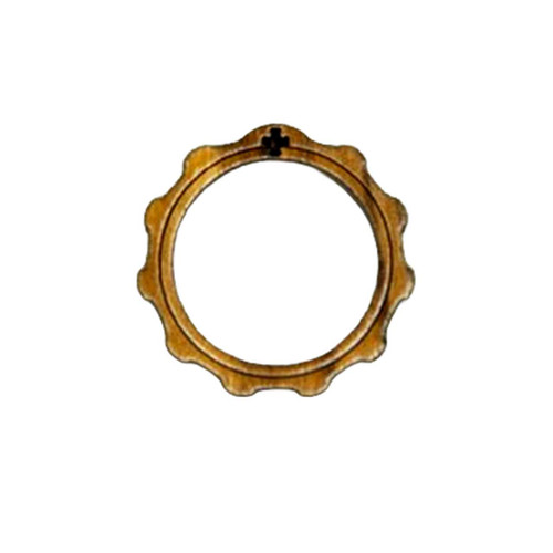 Rosary ring made of wood and shown from above with shadow in the cross cut out