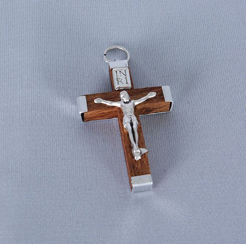 Crucifix with metal Corpus placard and tips measures 1 and 1 half inches made with wood and fitted with ring A35NAT Crucifix with metal Corpus placard and tips measures 1 and 1 half inches made with wood and fitted with ring A35NAT