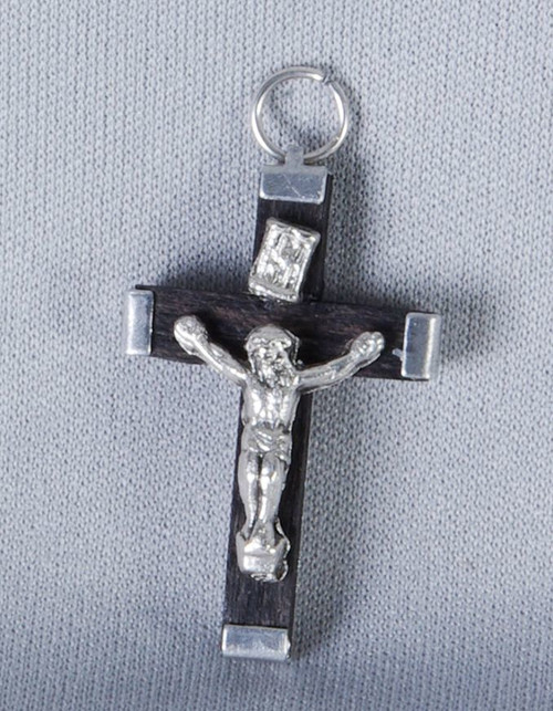black Crucifix with metal Corpus placard and tips measures 1 and 1 half inches made with wood and fitted with ring A35NERO black Crucifix with metal Corpus placard and tips measures 1 and 1 half inches made with wood and fitted with ring A35NERO