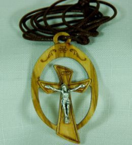 Encircled Crucifix necklace with oxidized metal corpus and black cord. 