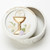 First holy communion keepsake box with blessed sacrament pictured on lid and accented in gold made of porcelain measures 2 and 1 quarter inches diameter ro46145