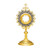 Traditional Monstrance with star shaped sunburst and silver filigree wreath 