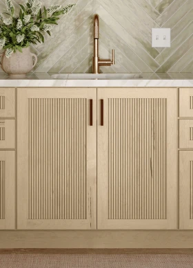 Kitchen with natural wood fluted KraftMaid cabinets