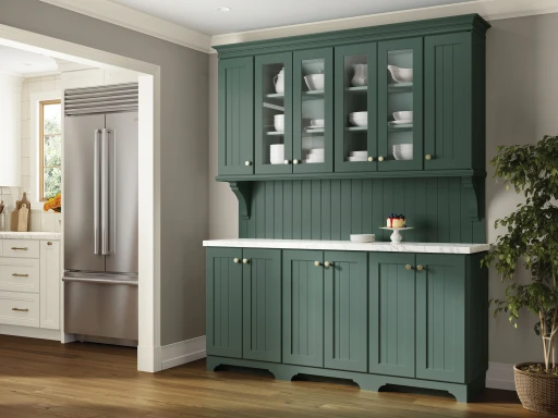 Kitchen with green KraftMaid cabinets