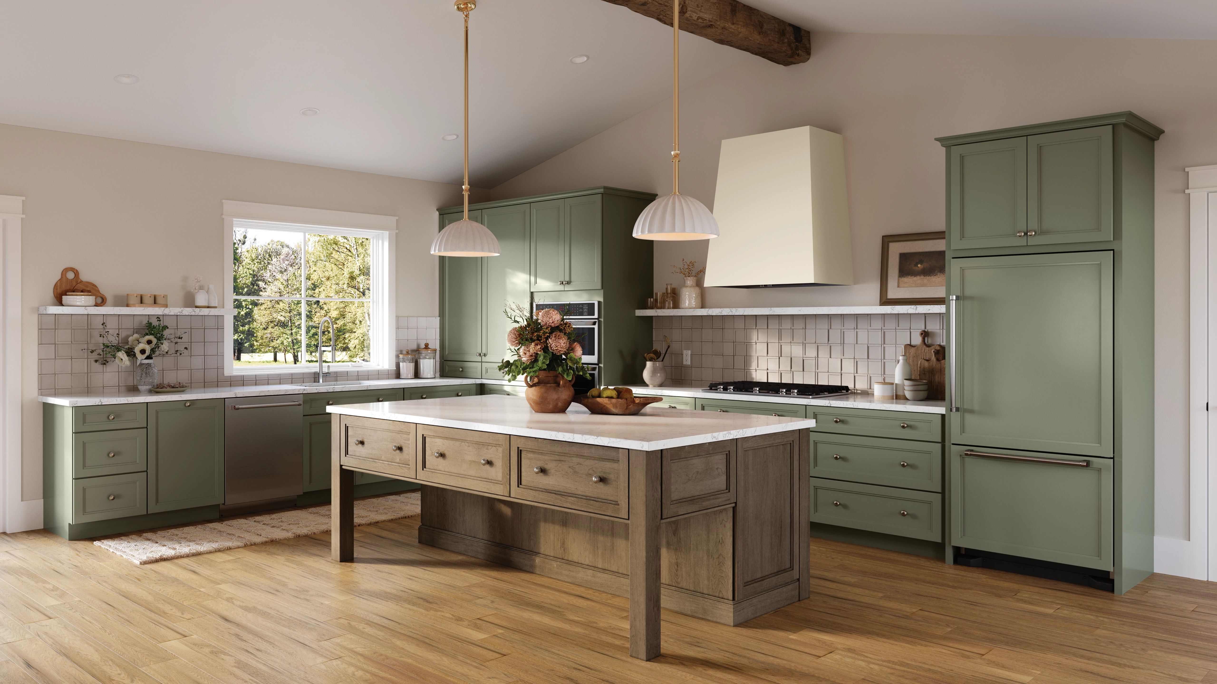 Traditional KraftMaid kitchen in Translucent Limestone finish with furniture island in Weathered Tavern finish