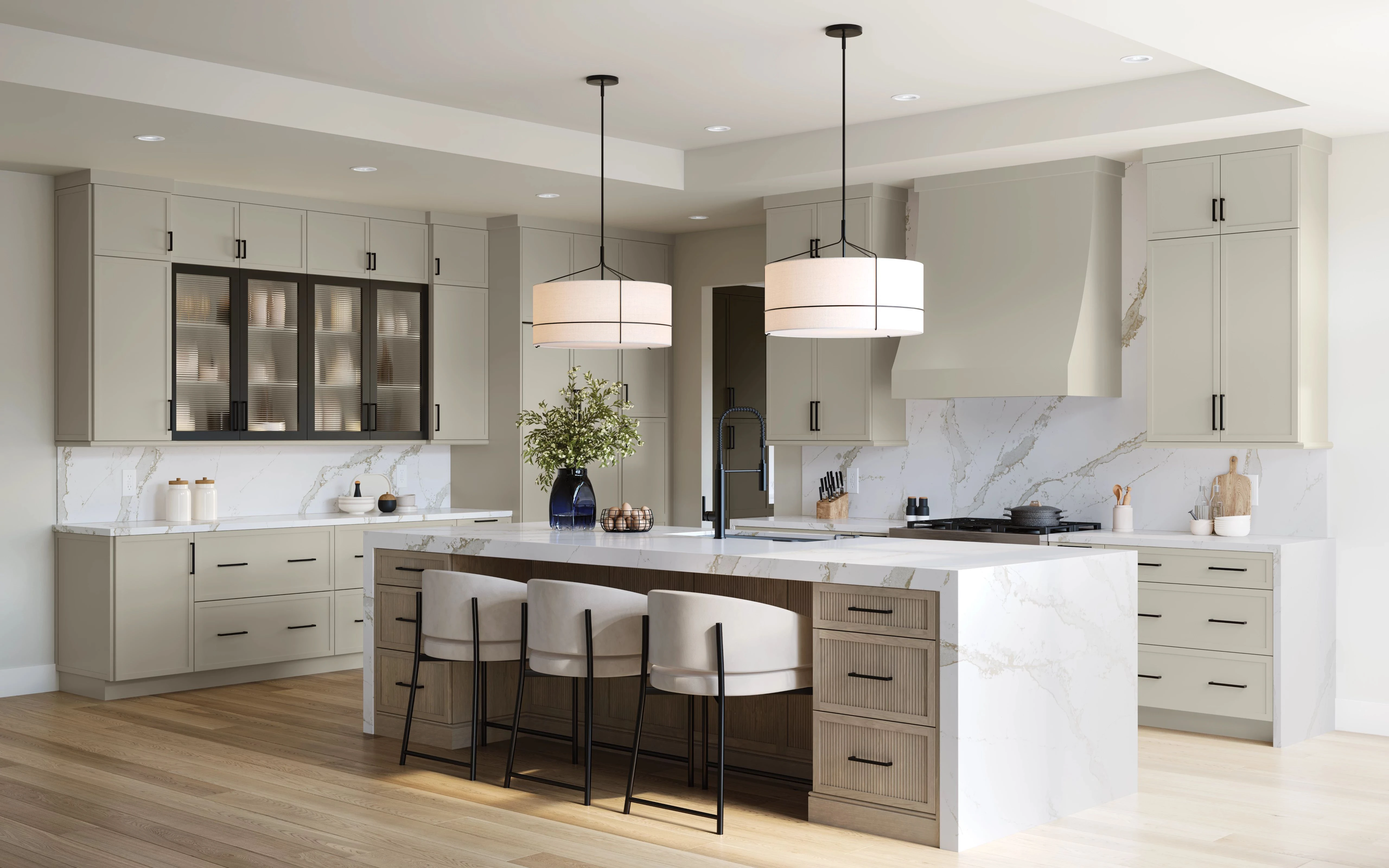 Bright white maple kitchen with a vaulted ceiling and large windows