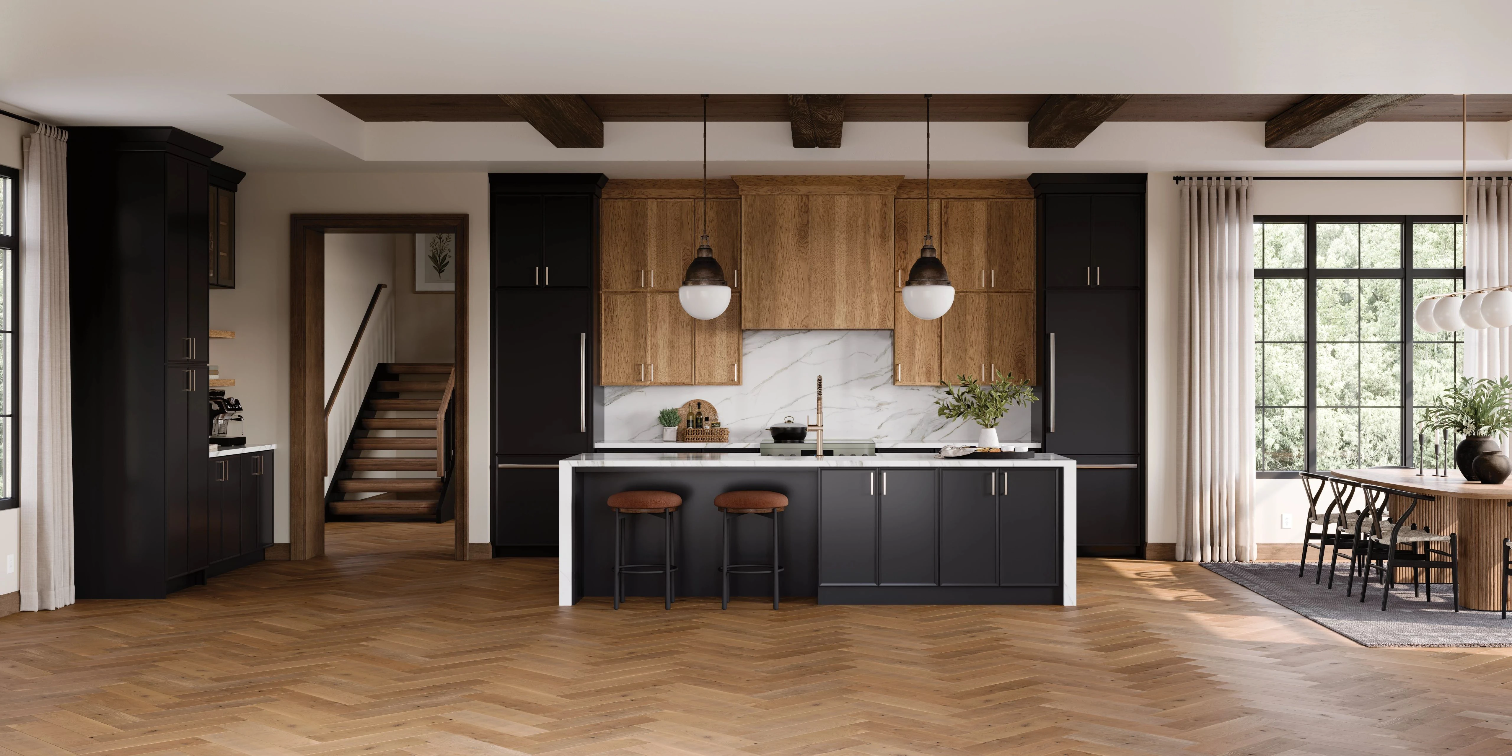 Coastal kitchen with cream maple cabinets, a white island, and an ocean view