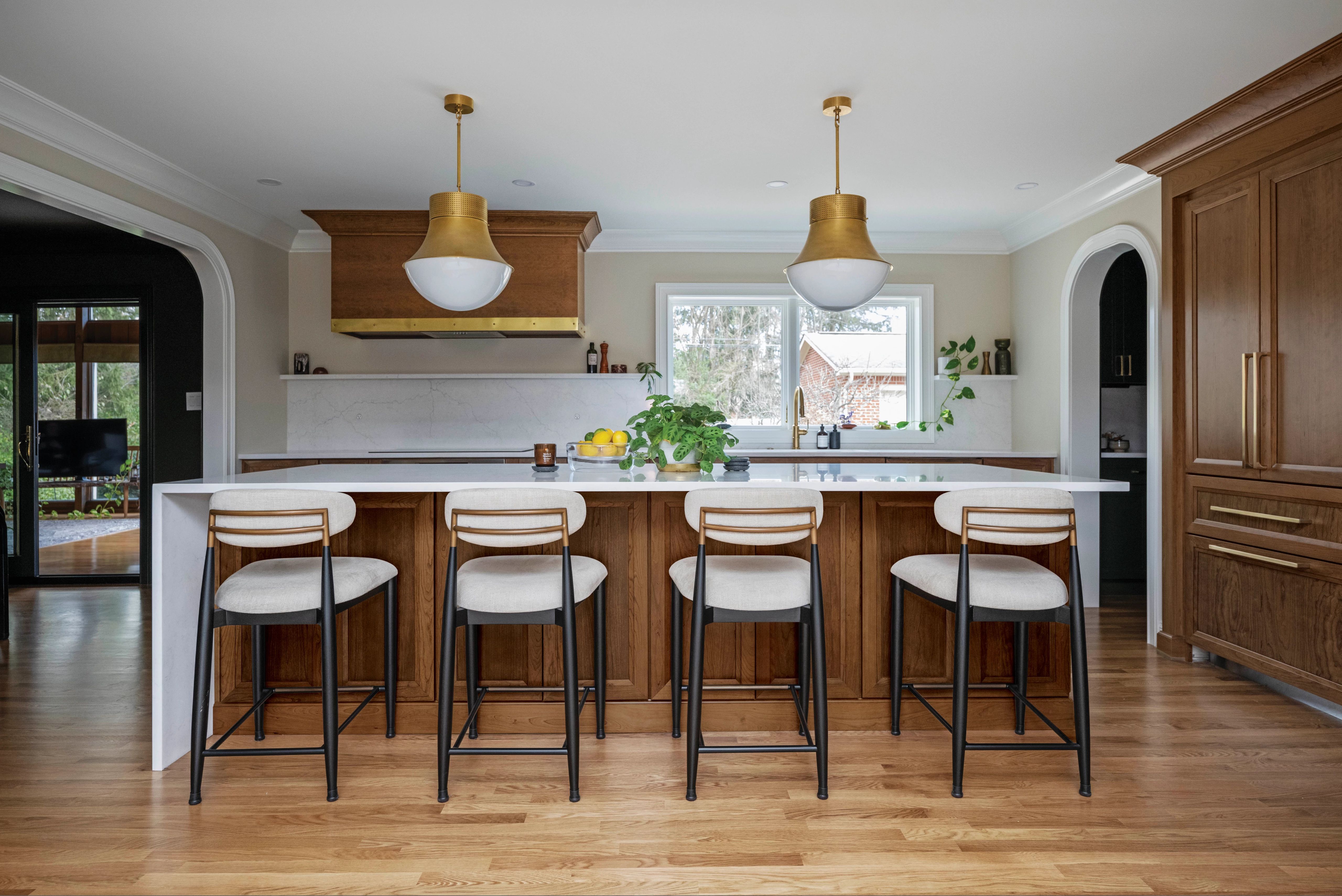 White quartz countertops with gray cabinets for a minimalist KraftMaid kitchen