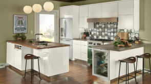 Modern KraftMaid kitchen featuring Dove White High Gloss Foil called Complimentary Geometry