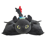 Toothless Sleeptime Lite unfolded into a soft plush pillow.