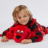 Child smiling lying on the Clifford the Big Red Dog Pillow Pet.