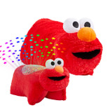 Elmo Sleeptime Lite and Elmo Pillow Pet together, with the Sleeptime Lite projecting colorful rainbow stars.