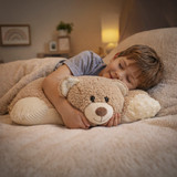 Lifestyle image of little boy snuggling and sleeping with the cute and comfy weighted Hiro Bear Pillow Pet