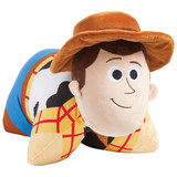Woody Pillow Pet folded into a plush pillow, featuring his smiling face, brown cowboy hat, yellow plaid shirt, cow-print vest, and blue jeans.