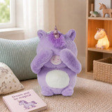 Lifestyle image of the cute lavender Pixie the Unicorn Boomeez with its hands covering its eyes