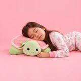 Strawberry Meadows Tuck the Turtle Lifestyle Image of a little girl sleeping onTuck