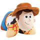 Woody Pillow Pet folded into a plush pillow, featuring his smiling face, brown cowboy hat, yellow plaid shirt, cow-print vest, and blue jeans.