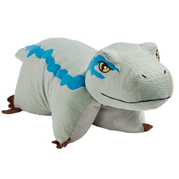 Jurassic World's Velociraptor Blue Pillow Pet in plush character form, featuring blue-gray scales, a light gray underside, blue stripes, and yellow eyes.